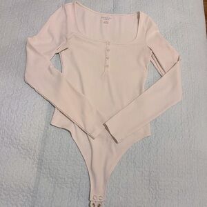 American Eagle Cream Long Sleeve Bodysuit
